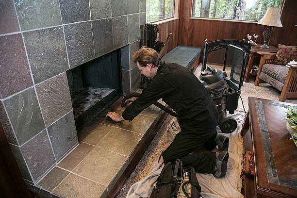 Chimney Sweep cleaning  fireplace inside of home
